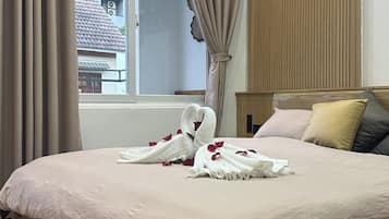 Minibar, desk, blackout curtains, iron/ironing board