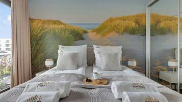 Iron/ironing board, travel crib, WiFi, bed sheets