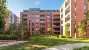 A modern apartment complex with multiple floors, balconies, and a well-maintained courtyard. - Scala 37 with Balcony | City Center | Parking (Gdańsk)