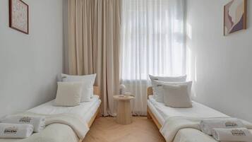 Iron/ironing board, travel crib, WiFi, bed sheets