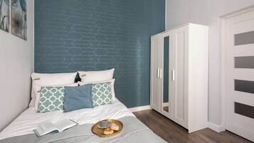 Iron/ironing board, travel crib, WiFi, bed sheets