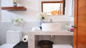 Shower, towels, soap, toilet paper