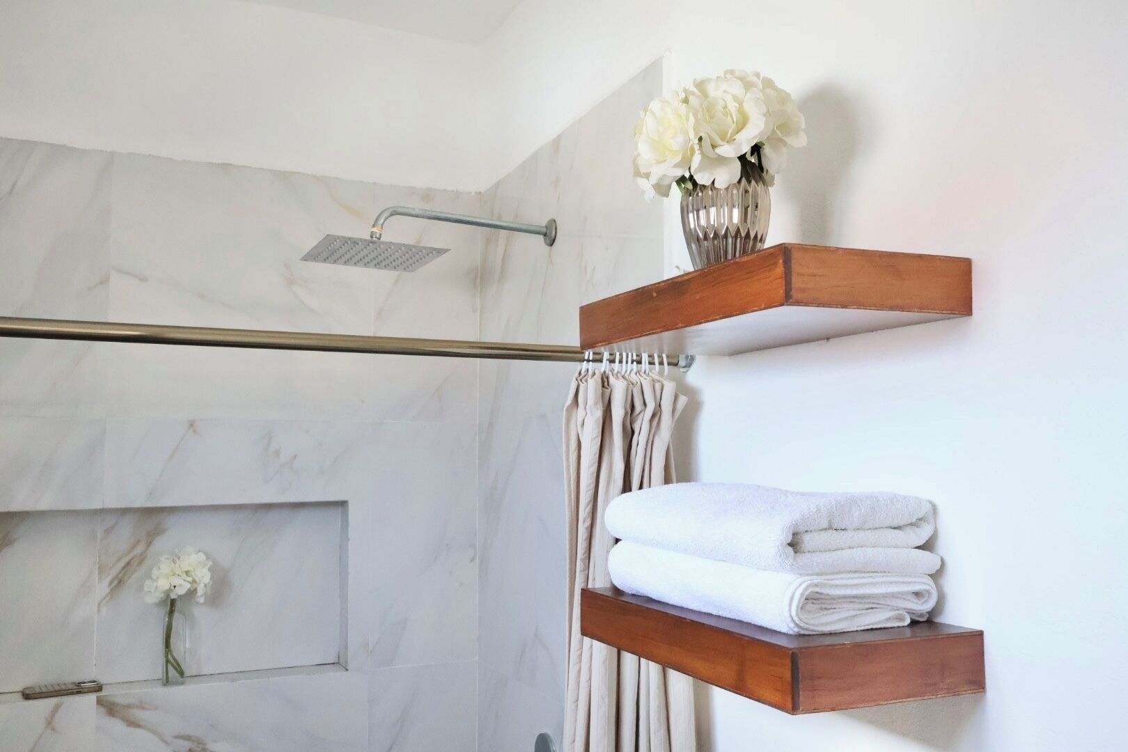 Shower, towels, soap, toilet paper
