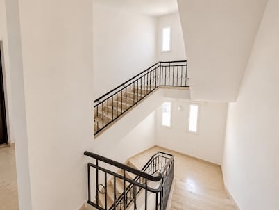 Three-bedroom apartment with ocean view—sleeps 7, a 5-minute walk from the beach and shops