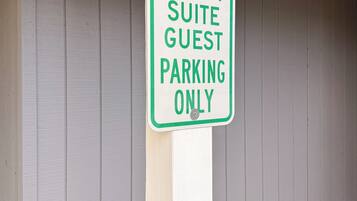A sign indicating 'Grant Suite Guest Parking Only.'