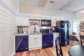 Coffee/tea maker, fridge, microwave, oven