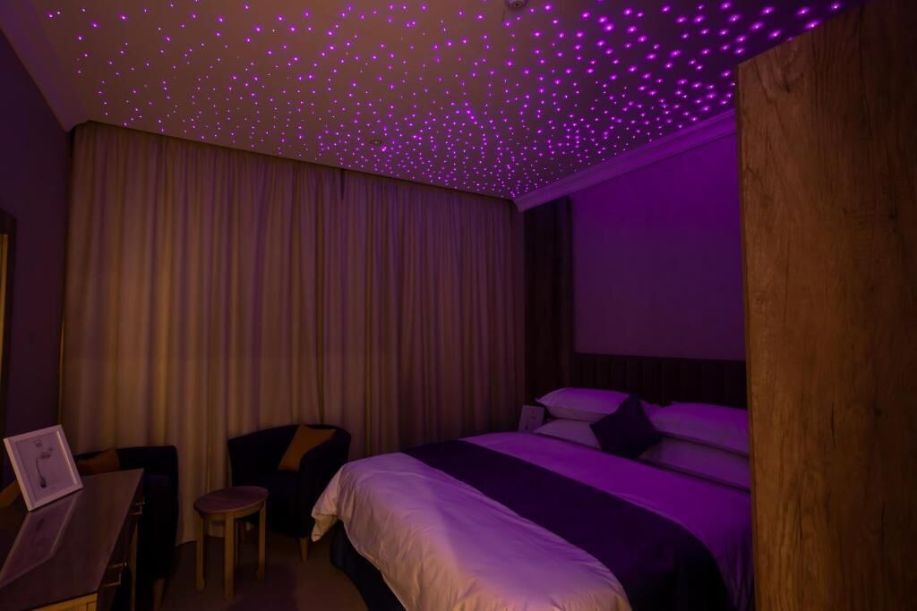 Family Suite, Garden View | In-room safe, blackout drapes, soundproofing, iron/ironing board