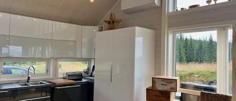 Coffee/tea maker, fridge, microwave, oven