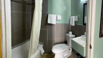 Standard Double Room, 2 Queen Beds, Smoking | Bathroom | Designer toiletries, towels, soap, shampoo