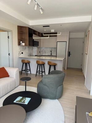 Deluxe-Apartment, Stadtblick | Wohnbereich