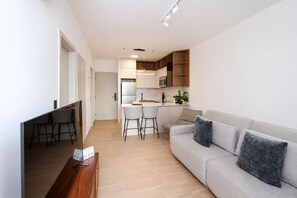 Deluxe Apartment, City View | Living area | LED TV