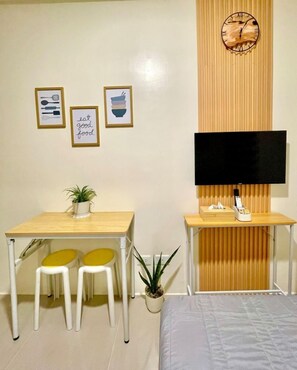 Iron/ironing board, bed sheets - Modern Studio Living at Urban Deca Towers Cubao (Quezon City)