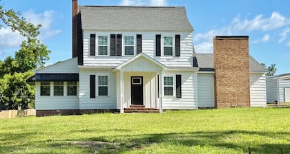 The Country Farmhouse offers five bedrooms and is located in peaceful location.