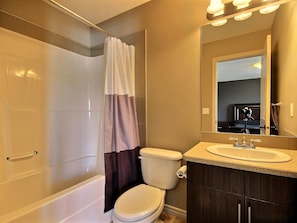 Hair dryer, towels, soap, toilet paper - Cozy 2-Bedroom Duplex with 4 Beds Near Henday & Shops (Edmonton)
