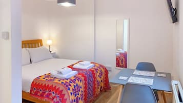 Wi-Fi de cortesia, roupa de cama