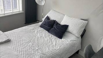 Wi-Fi de cortesia, roupa de cama