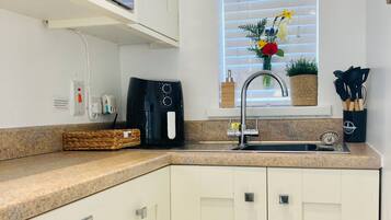 Fridge, microwave, stovetop, electric kettle