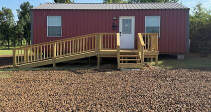 Lightfoot LakeHouse - Terrific 1-bedroom house in cozy Huxley, TX at Toledo Bend