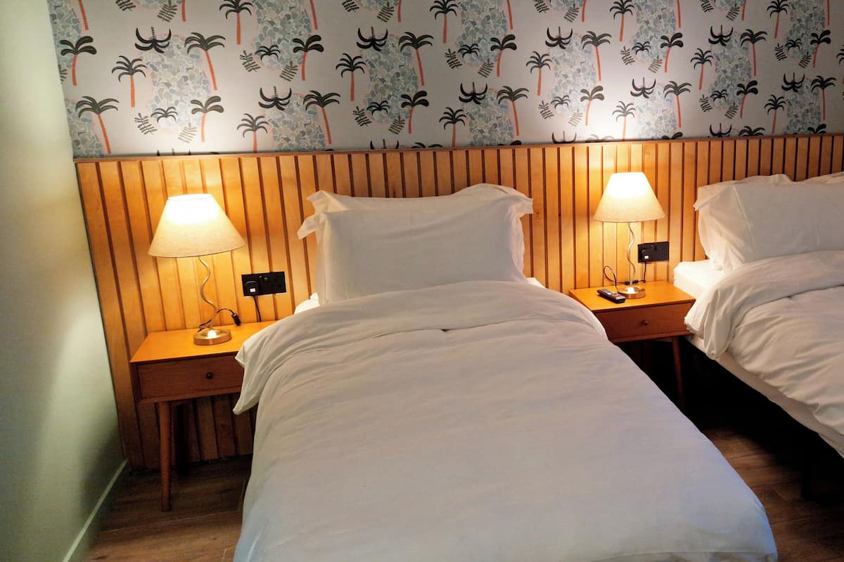 Double or Twin Room, Patio, Sea View | In-room safe, iron/ironing board (on request), WiFi (free)