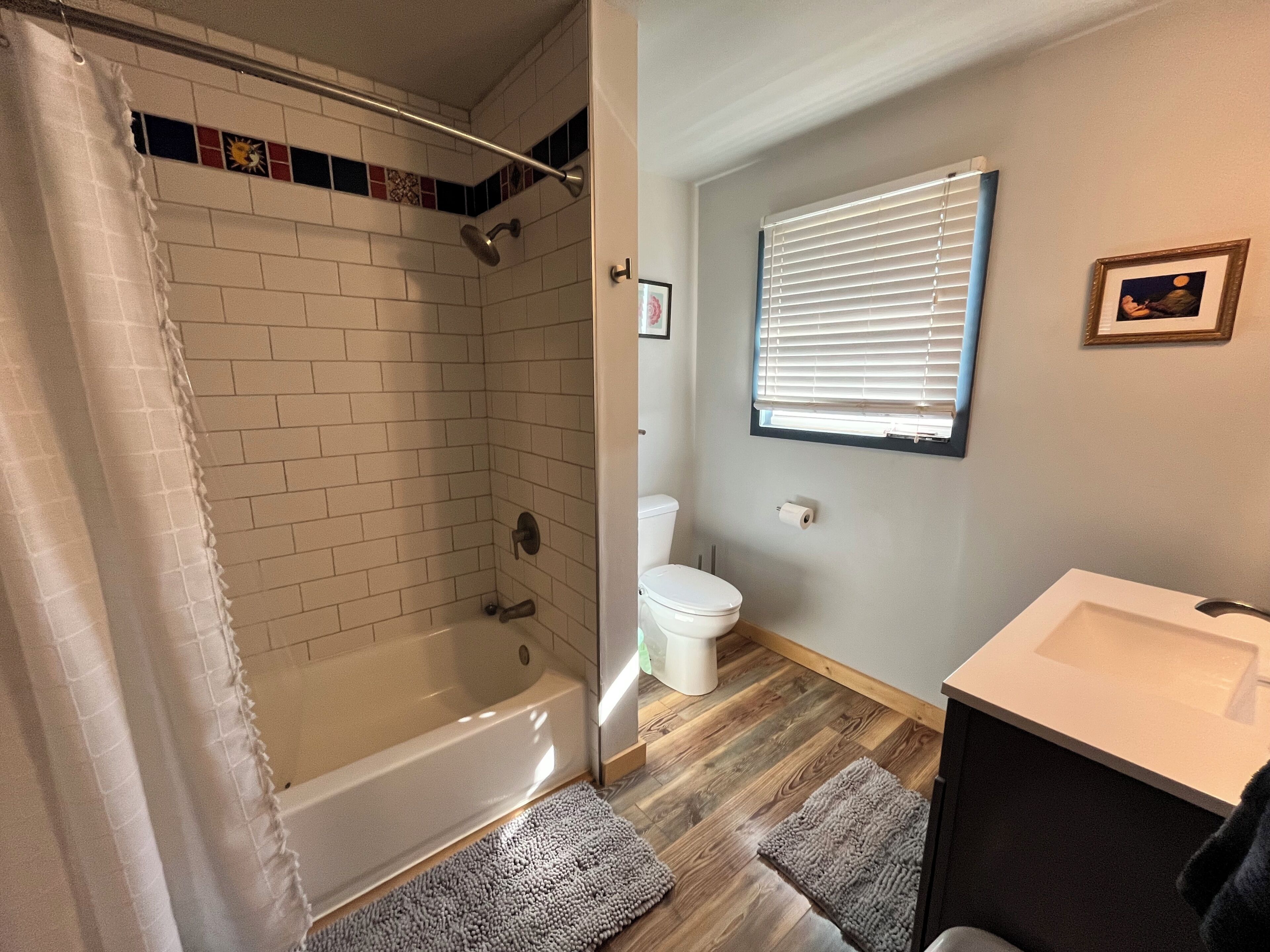 Eco-friendly toiletries, hair dryer, bidet, towels