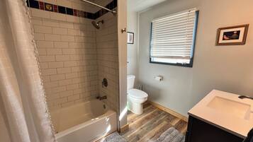 Eco-friendly toiletries, hair dryer, bidet, towels