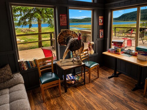 Room With Scenic Lake And Mountain Side Views