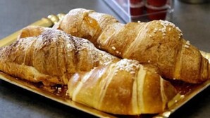 A table with croissants and cups of coffee. - Palazzo Ferrara  (Naples)