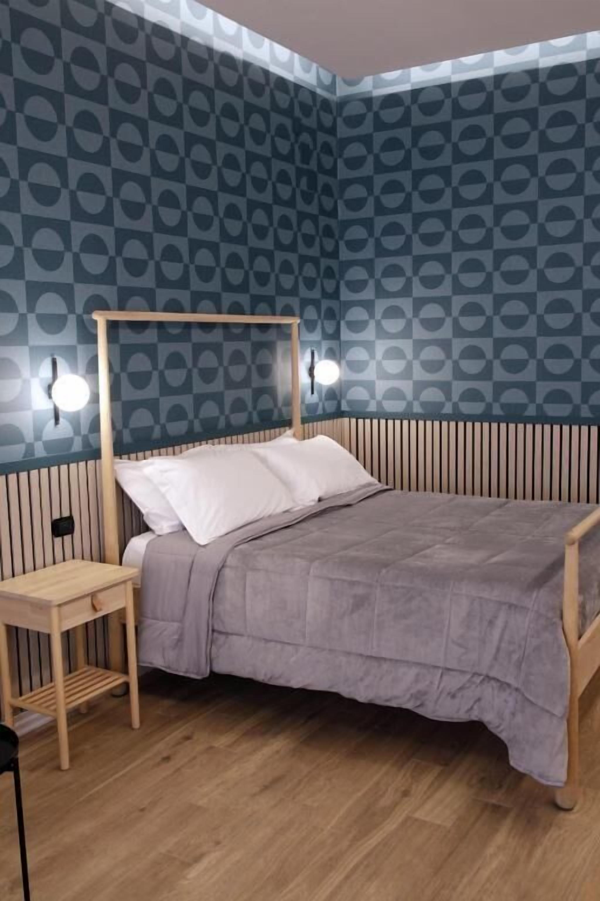 Comfort Room, Balcony, Courtyard View | In-room safe, iron/ironing board