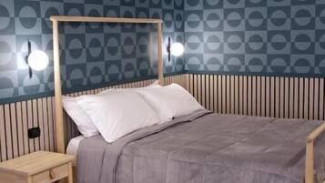 Comfort Room, Balcony, Courtyard View | In-room safe, soundproofing, iron/ironing board, free WiFi