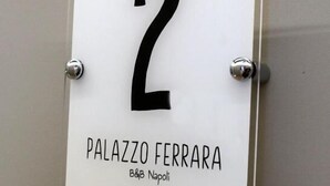 A sign with the number '2' and the text 'PALAZZO FERRARA B&B Napoli' indicating a hotel room number. - Palazzo Ferrara  (Naples)