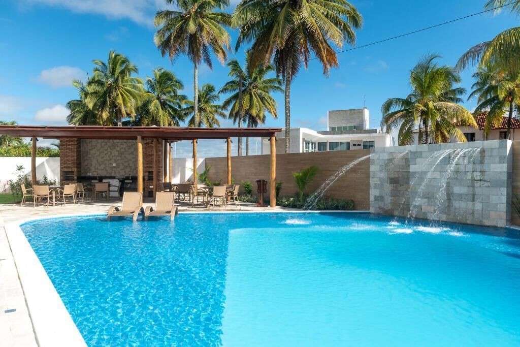 Indoor pool, open 9:00 AM to 6:30 PM, pool umbrellas, pool loungers