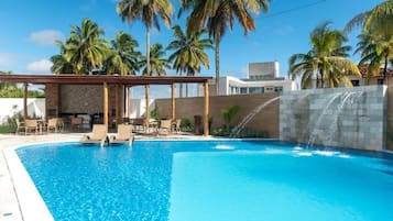 Indoor pool, open 9:00 AM to 6:30 PM, pool umbrellas, pool loungers
