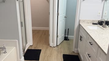 Hair dryer, towels, shampoo, toilet paper