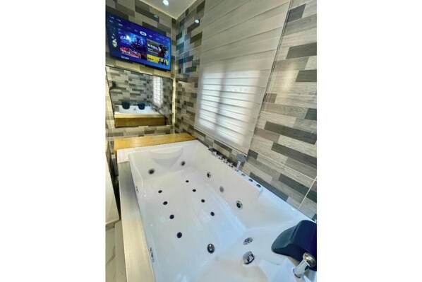 Shower, bidet, towels, soap