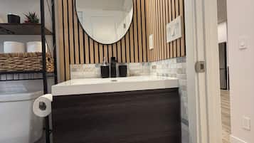 Hair dryer, towels, soap, toilet paper
