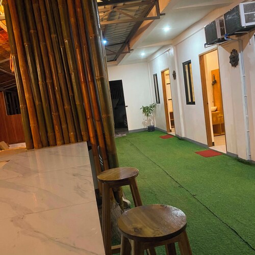 Charming 3-bedroom apartment with AC, smart tv , fridge ,wifi, kitchen ,& garage