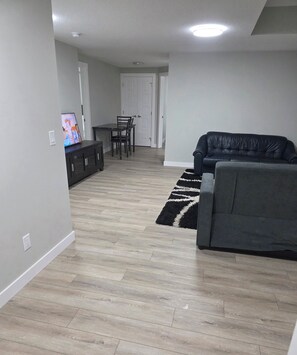 Living area - Modern 2BR Suite | King Bed | Private Entrance I Glacier Ridge NW Calgary (Calgary)