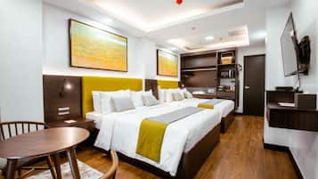 Habitación cuádruple Premium | Caja fuerte y wifi gratis