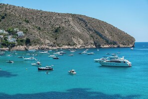 A coastal area with numerous boats and yachts anchored in clear blue waters. - Valeria - By Amarina Villas (JAVEA)