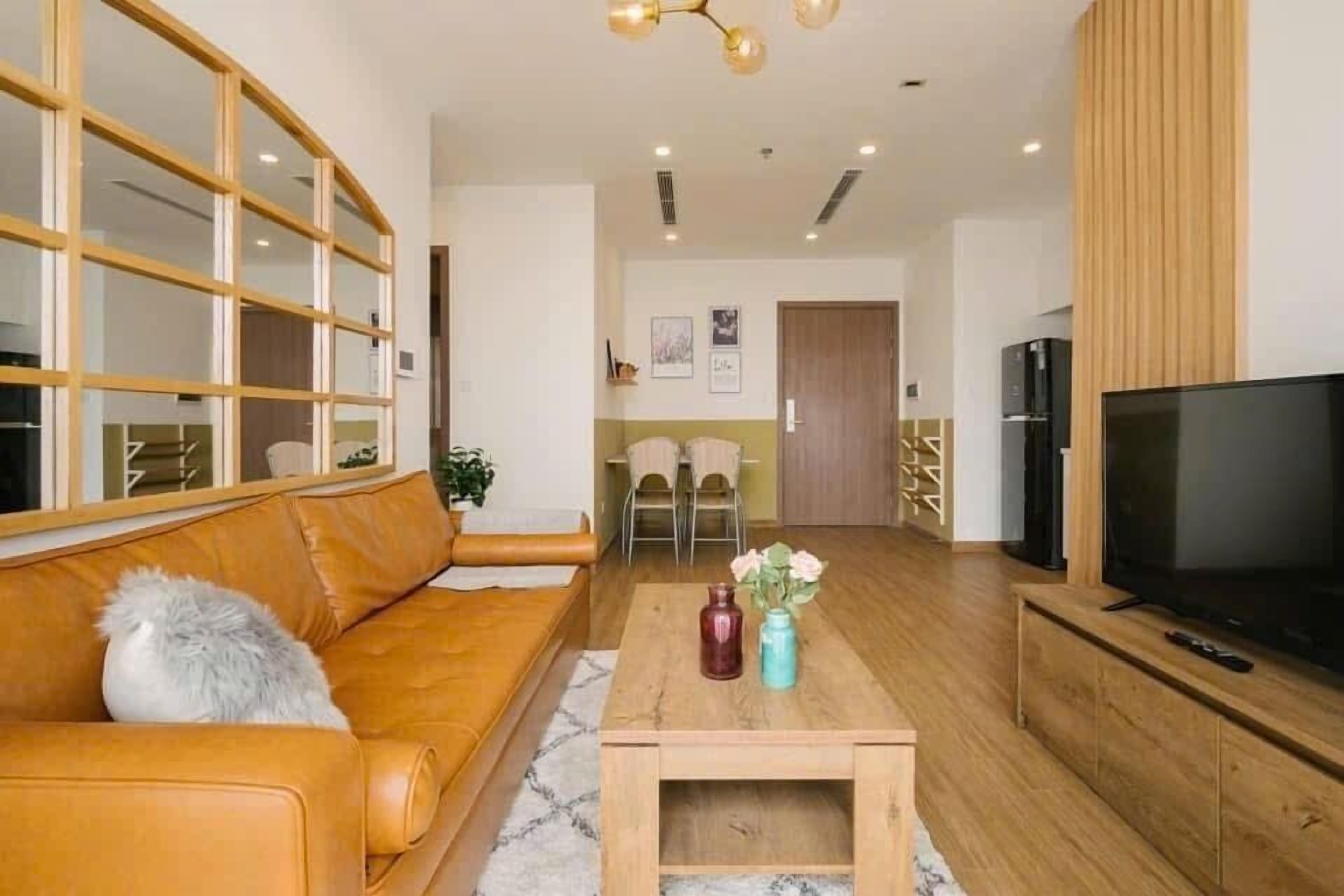 Luxury Apartment, 2 Bedrooms, City View, Tower | Living area | 65-inch flat-screen TV with cable channels