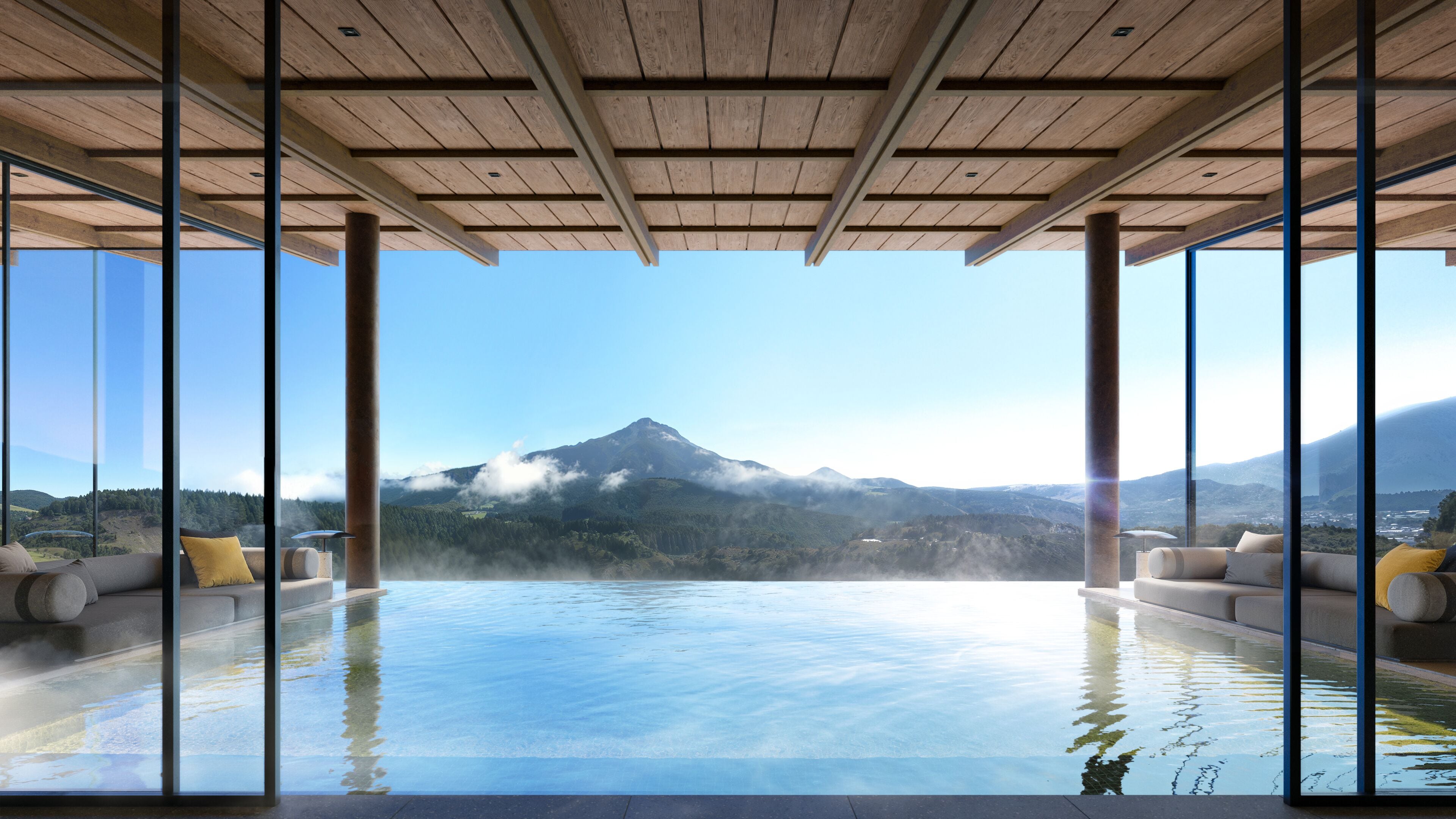 A modern infinity pool with a mountain view, wooden ceiling, and comfortable seating.