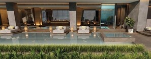 Una piscina techada, una piscina al aire libre, camas de piscina gratis