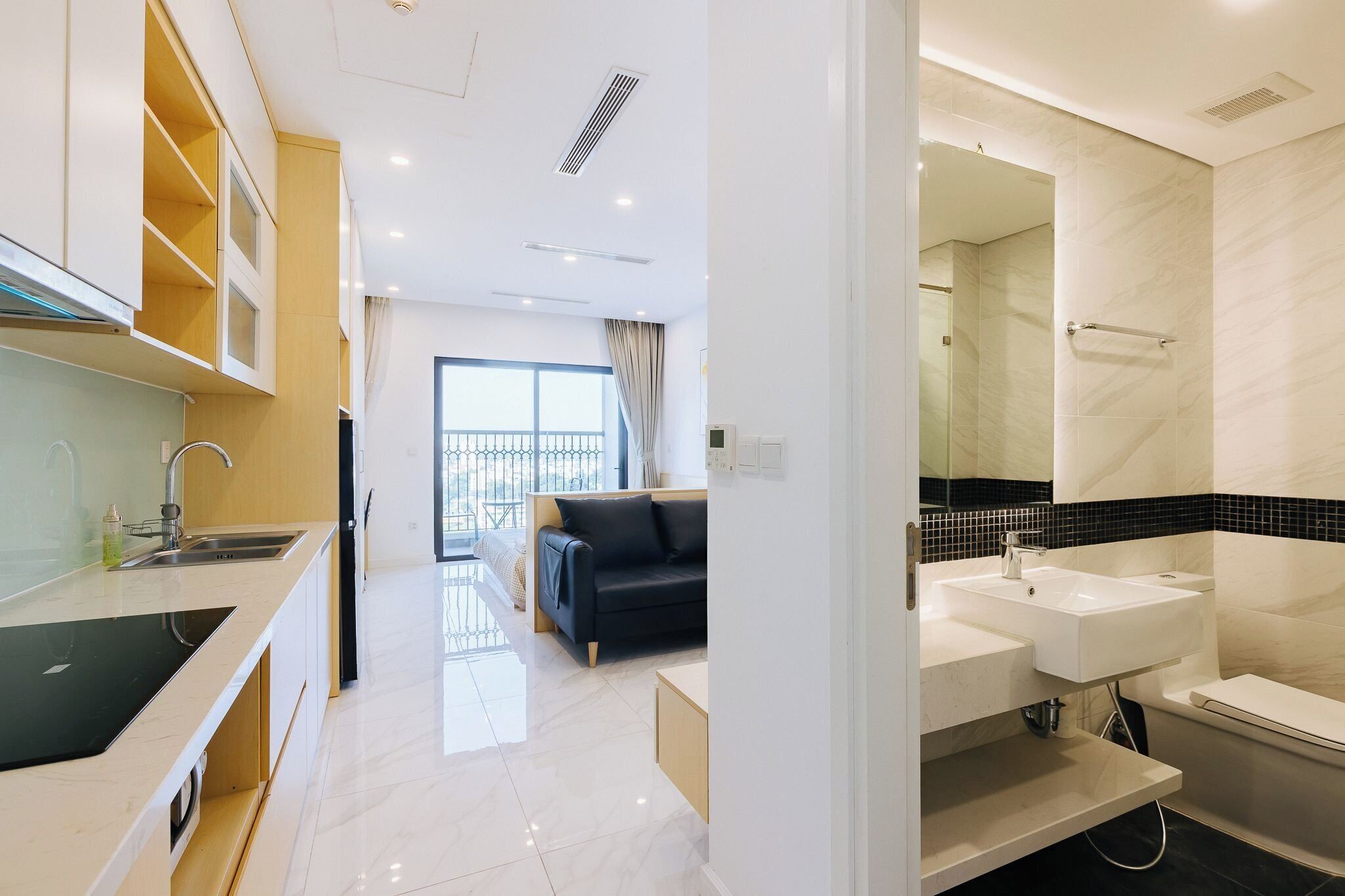 Apartament estàndard, vistes a la ciutat | Bany | Dutxa, articles de tocador gratuïts, assecador de cabells i sabatilles 