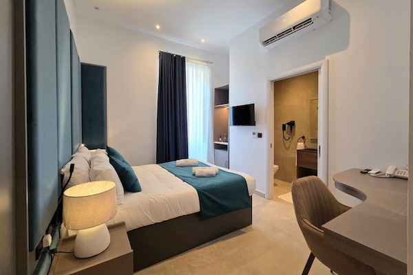 Comfort Double Room (Suite 202) | Desk, laptop workspace, blackout drapes, iron/ironing board (on request)