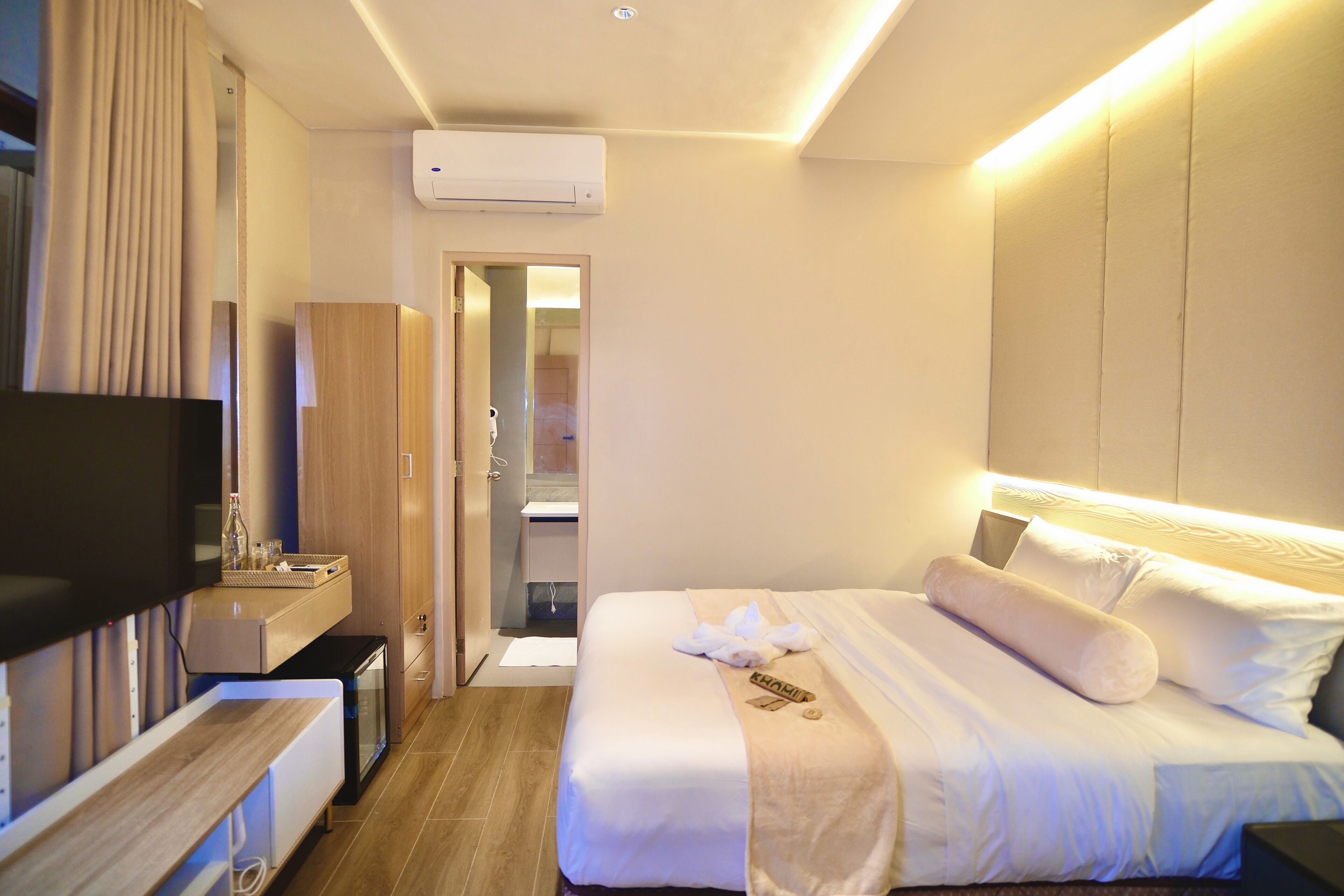 Deluxe Triple Room, Pool View | In-room safe, desk, laptop workspace, blackout drapes