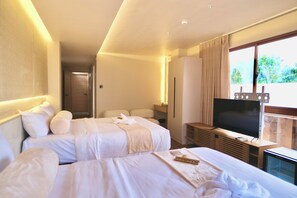 Superior Quadruple Room, Pool View | In-room safe, desk, laptop workspace, blackout drapes - Khami House Resort (Panglao)