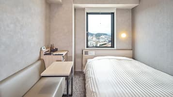 Standaard tweepersoonskamer | Een bureau, gratis wifi, beddengoed