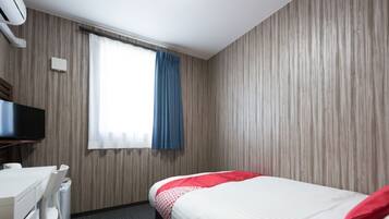 Basic Single Room | Blackout drapes, iron/ironing board