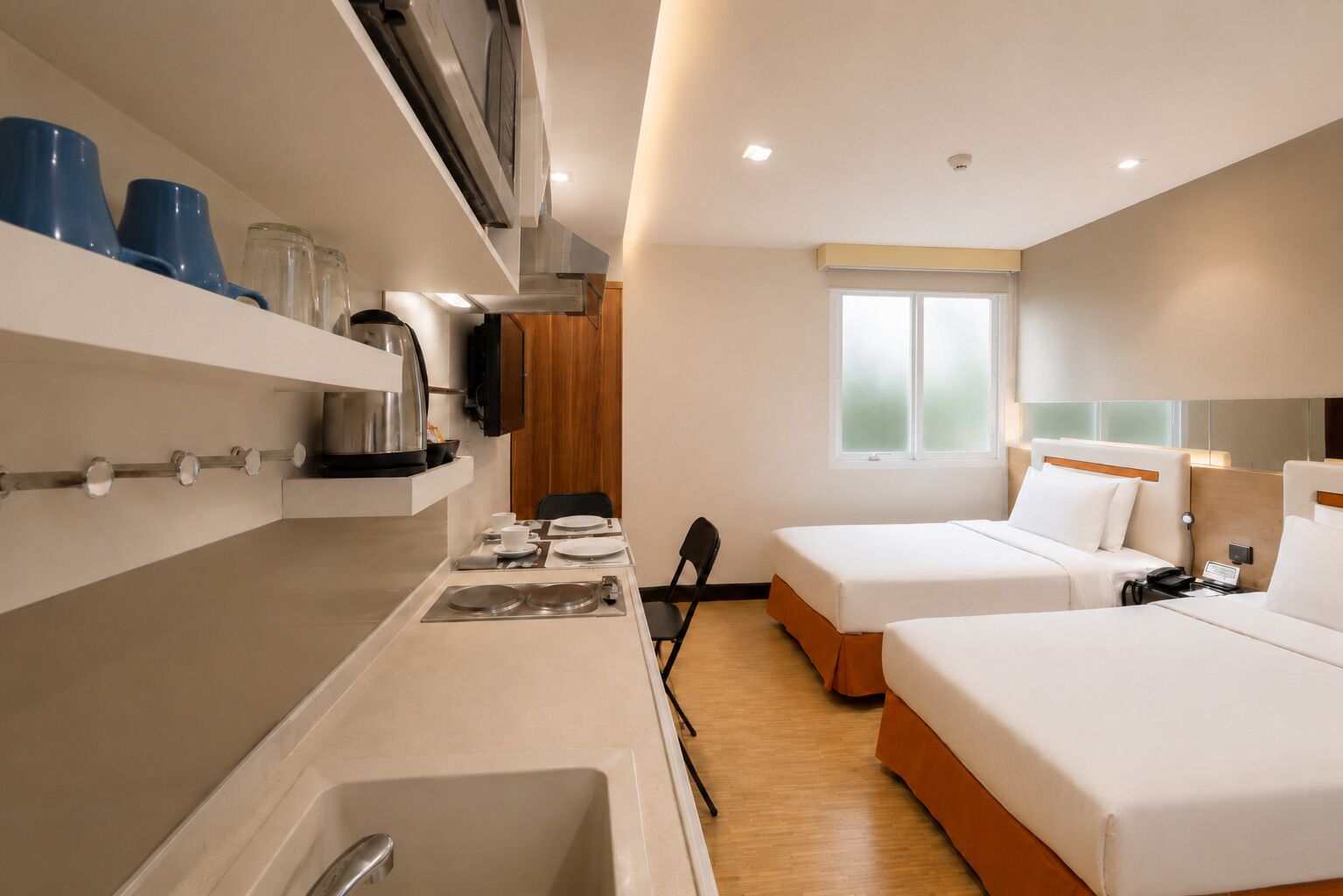 Comfort Twin Room, City View | Private kitchenette | Mini-fridge, microwave