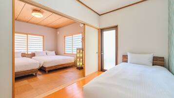 Deluxe Condo, City View | Desk, laptop workspace, iron/ironing board, free WiFi